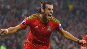 Gareth Bale celebrates scoring a goal for Wales.