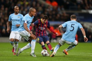 Three Man City players try in vain to stop Lionel Messi in a previous Champions League encounter.