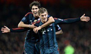 Toni Kroos celebrates after scoring as Bayern knocked Arsenal out of the 2013/14 Champions League.