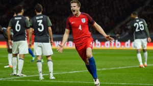 Eric Dier celebrates scoring the 91st minute winner against Germany one year ago.