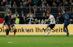 Lukas Podolski scores the winner in what was otherwise a positive night for England in Germany.