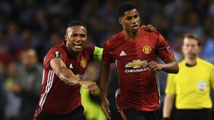 Marcus Rashford and Antonio Valencia seconds after the young England striker scored against Celta Vigo.